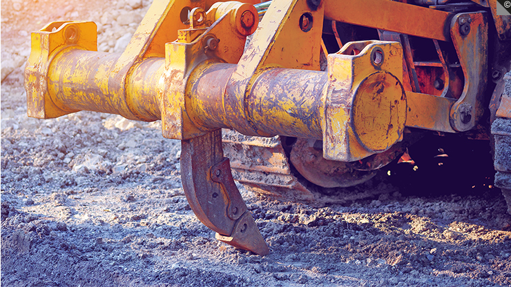 Le tiltdozer muni d'une lame s'inclinant sur un plan vertical