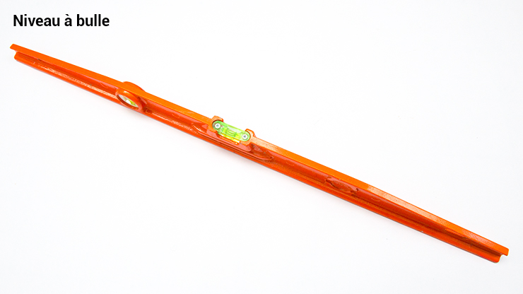 Le niveau à bulles de maçon