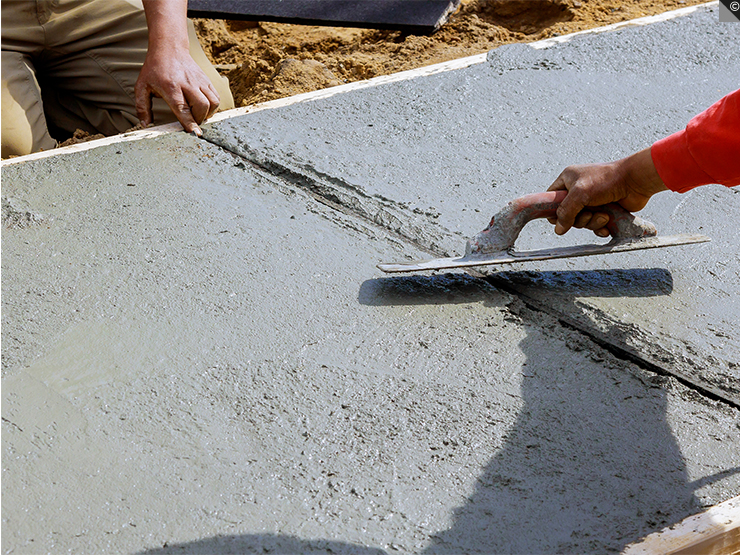 Le béton étalé manuellement